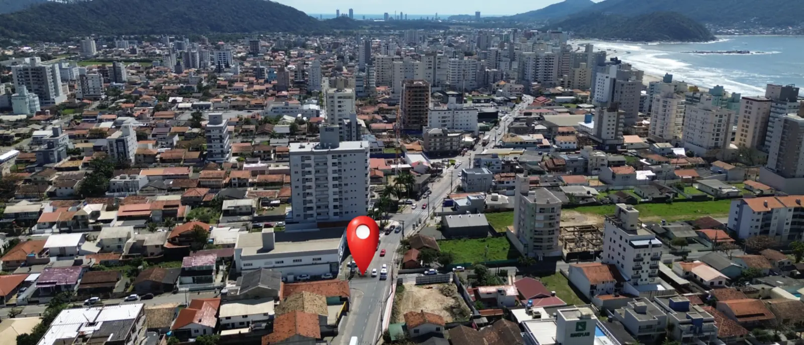 Vista aérea do bairro Gravatá, em Navegantes/SC, com a localização da MS Clínica marcada na Av. Pref. José Juvenal Mafra